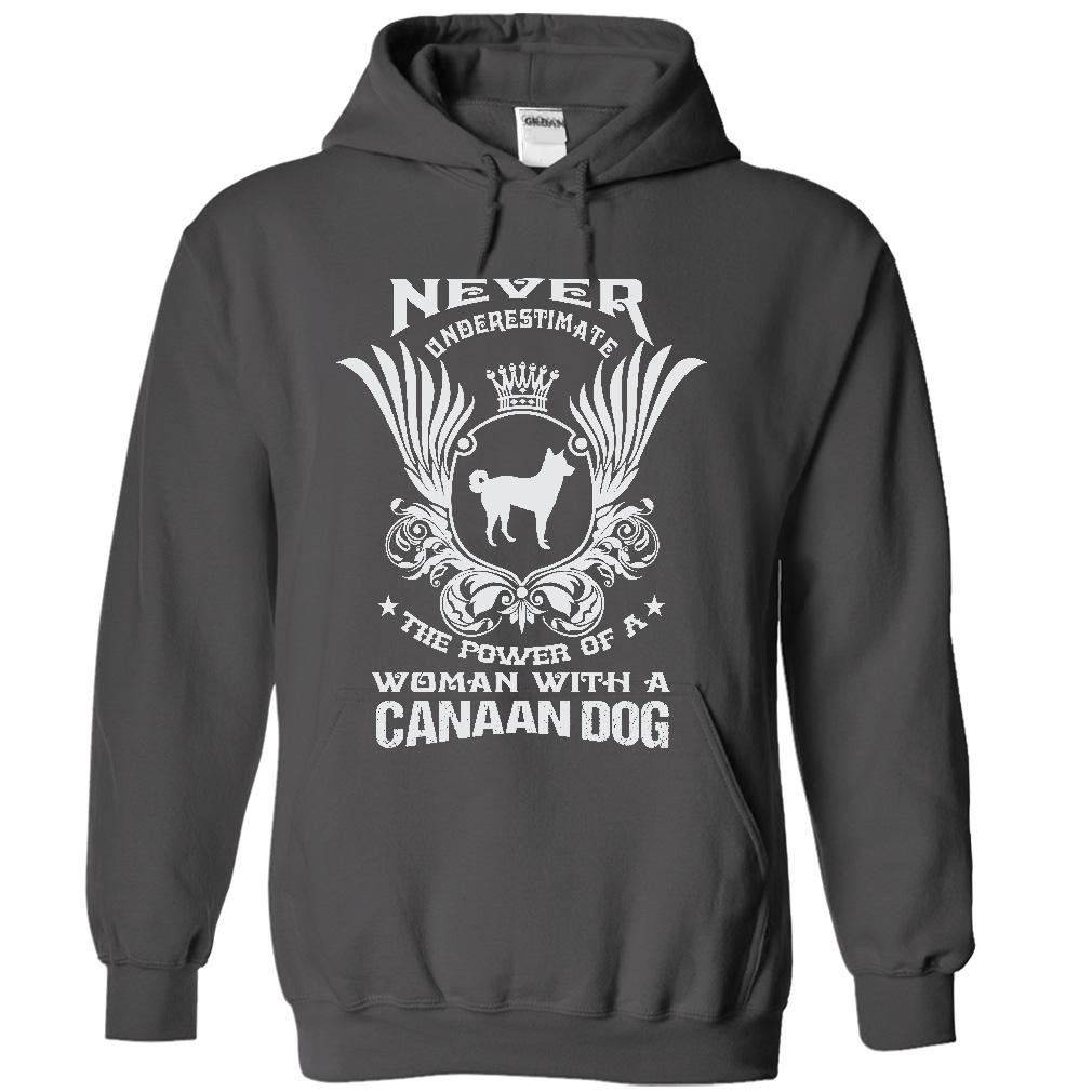 NEVER UNDERESTIMATE THE POWER OF A WOMAN WITH A CANAAN DOG