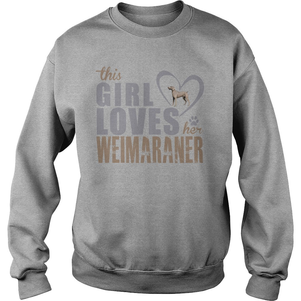 This Gril loves her Weimaraner